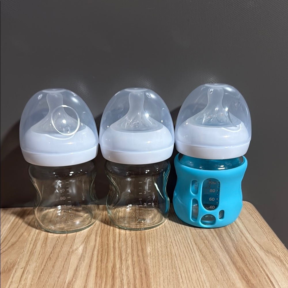 Set of 3 Glass Phillips Avent Baby Bottles with One Blue Sleeve